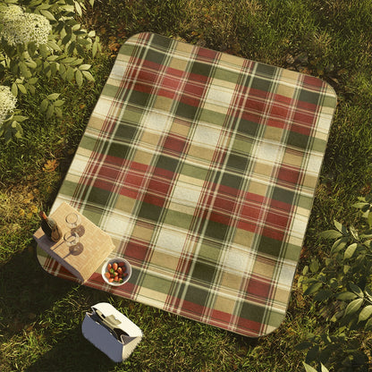 TekPaws Evergreen Escape plaid picnic blanket on the grass