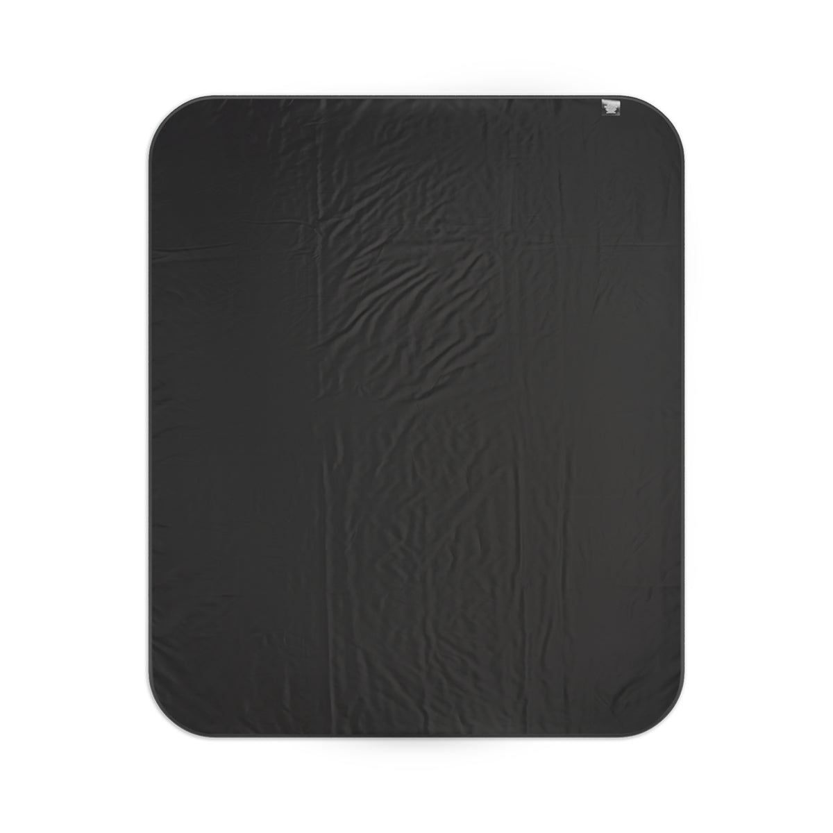 Black water-resistant back of the Evergreen Escape picnic blanket
