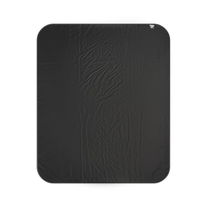 Black water-resistant back of the Evergreen Escape picnic blanket