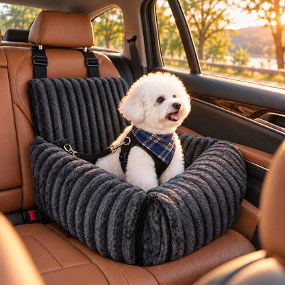 Bichon Frise riding in the Dark Gray TekPaws RoadNest dog car seat at sunset